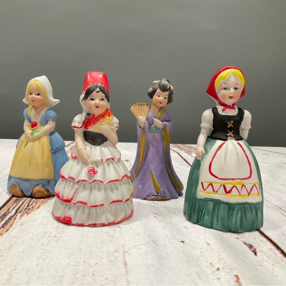 VINTAGE JSNY PORCELAIN SPANISH, DUTCH AND JAPANESE GERMAN BELL BY FLAMBRO
